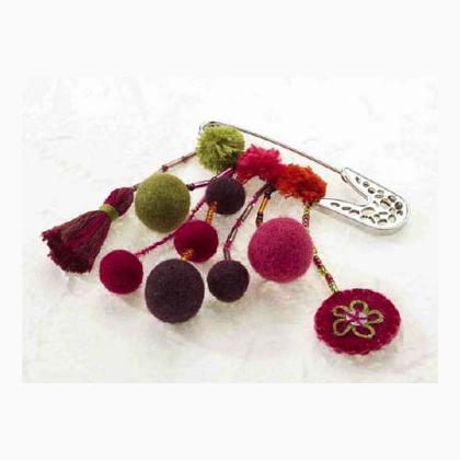 Spilla pompon e palline rosa