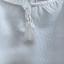 Blusa ricamabile con maniche decorate