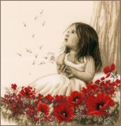Bambina in un campo di papaveri
