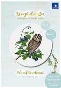 Eule auf Brombeerast