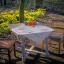 Centro Tavola - Conigli di Pasqua in un giardino di tulipani