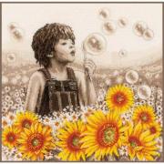 Bambino con i girasoli