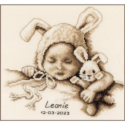 Bambino e coniglio coccoloso