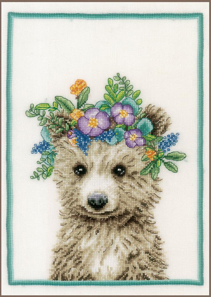 Orso con corona di fiori
