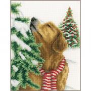 Cane in un paesaggio di Natale