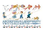 ABC bambini con gli aquiloni al mare